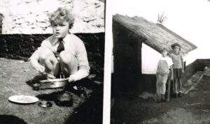 Dick and Romemary Davidson next to old dog kennel which they used as their Cubbic house